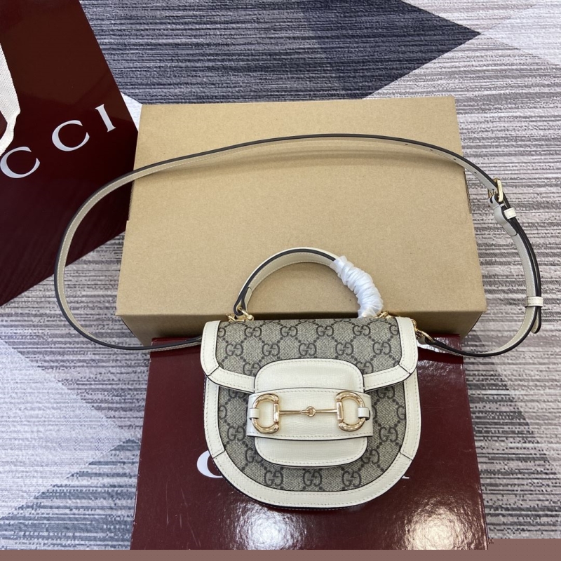 G*u*i top handle bags